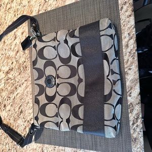 Black, grey with black cloth interior. Barely worn.